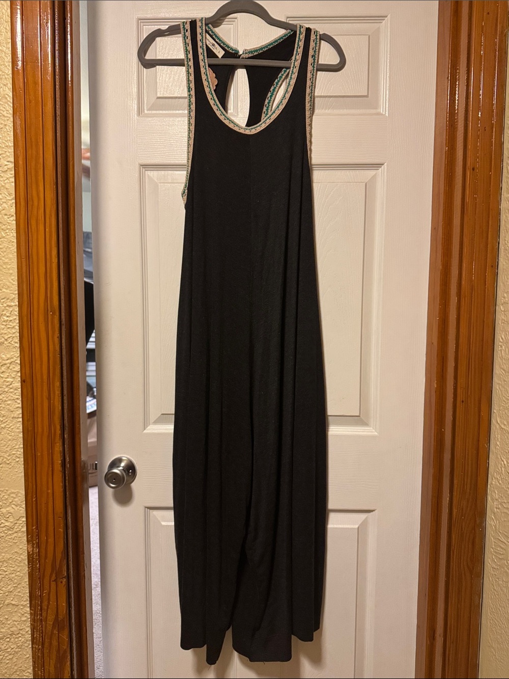 NATURAL LIFE Black Romper with Beaded Trim has pockets